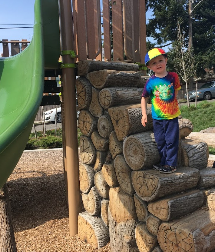 Climbing logs up play equipment.