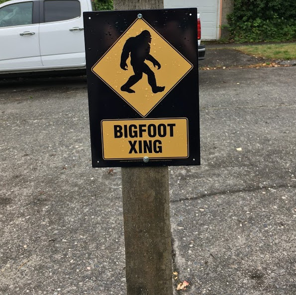 Crossing sign with a picture of bigfoot and the text "Bigfoot Xing".