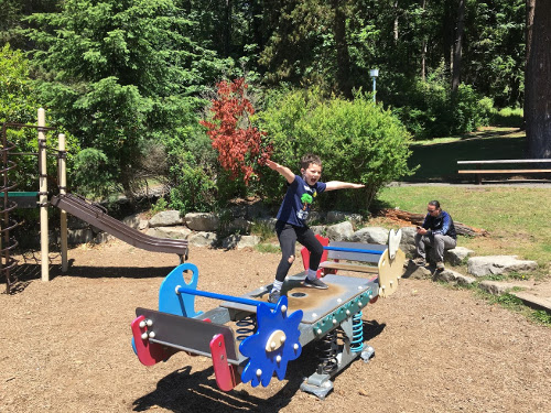 Calvin on the middle of a teeter-totter.